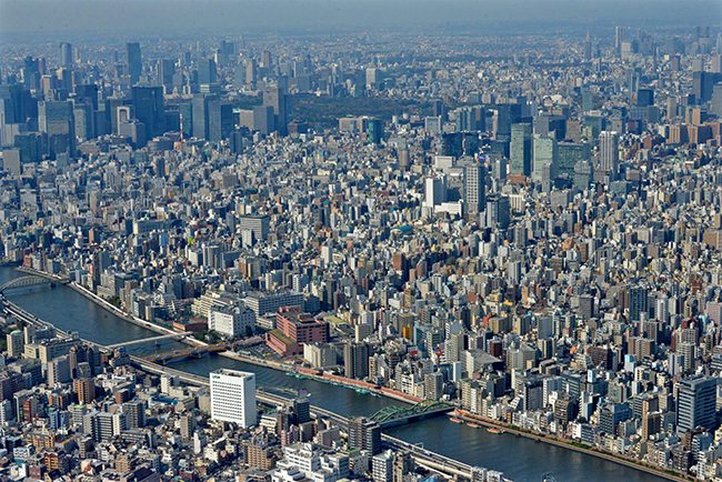 Tokyo from above. Tokyo is the capital of Japan, and one of the biggest  cities in the world. It has a population of 14million, with a Metropolitan  population of almost 40million. It